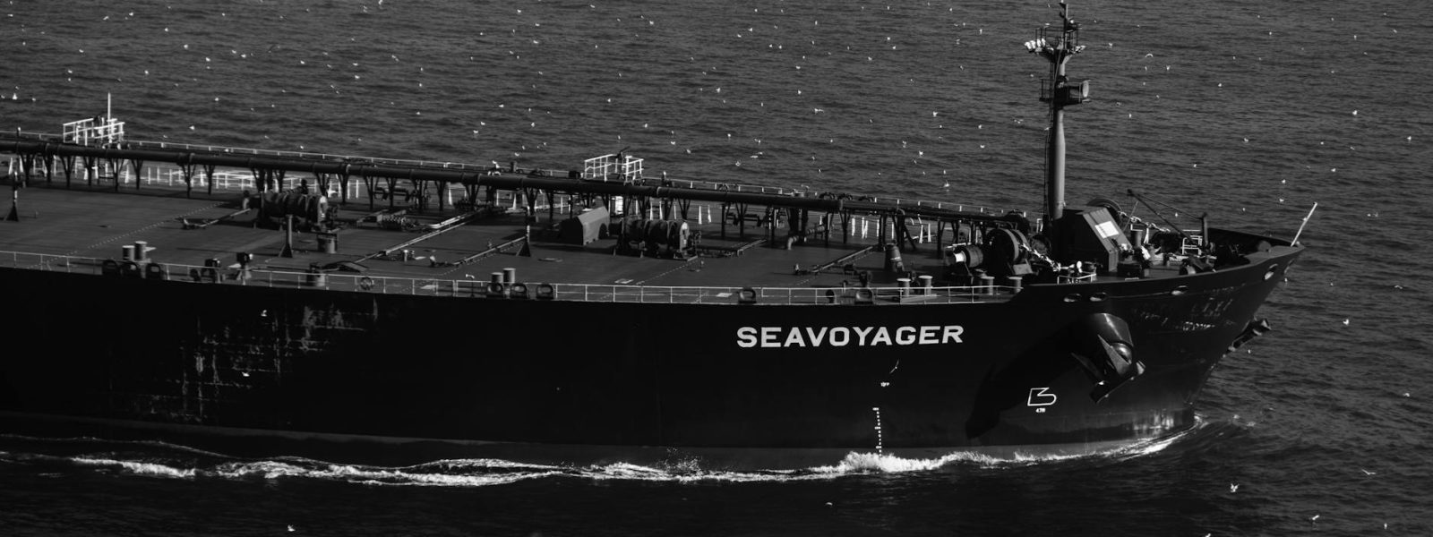 US-Iran Peace Deal, trade pause, oil tanker, oil prices, seavoyager tanker ship on the sea in black and white