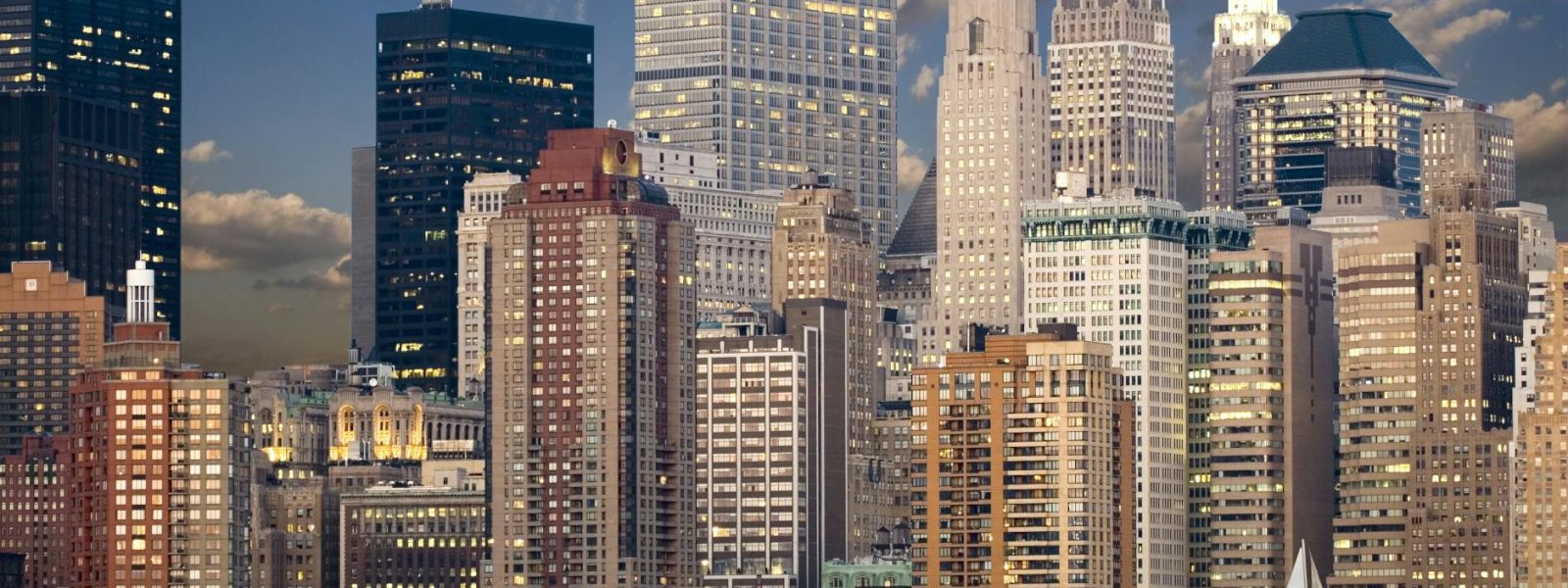 global market, cityscape during nighttime near body of water and sail boat, corporate earnings